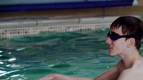 Children playing in pool Stock-Footage 91893704