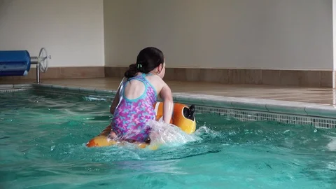 Children playing in pool Stock-Footage 91893723
