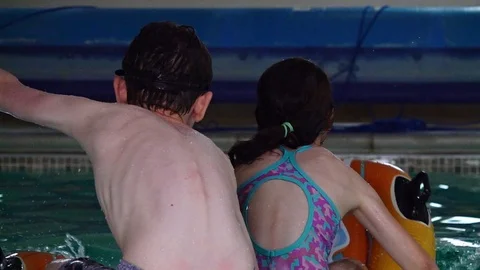 Children playing in pool Stock-Footage 91898787