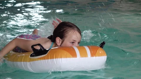 Children playing in pool Stock-Footage 91899182