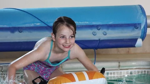 Children playing in pool Stock Footage 91899543