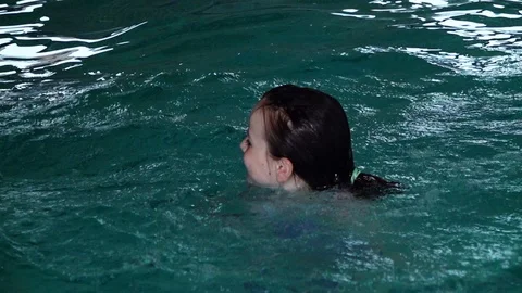 Children playing in pool Stock Footage 91900167