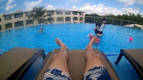 Children playing in pool Stock Footage 107823205