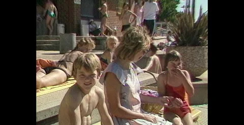Children Playing at Public Pool and Summer Fun, Australia (1985) Stock Footage 310869680