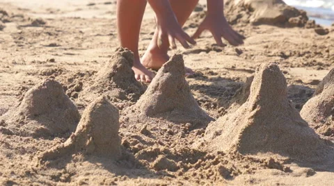 Children playing sand on the beach Stock Footage 42549908