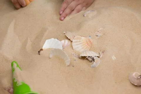 Children Playing In The Sand Stock Photos