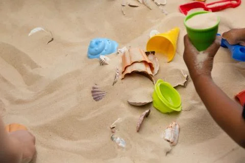 Children Playing In The Sand Foto stock