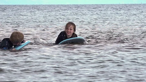 Children playing in the sea Stock Footage 93050537