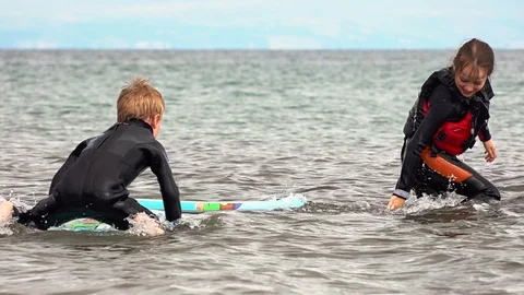 Children playing in the sea Stock Footage 93067514