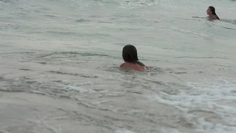 Children playing in the sea Stock Footage 139403123