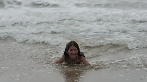 Children playing in the sea Stock Footage 139403132