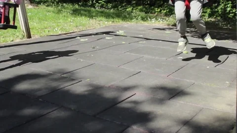 Children playing with seesaw Stock Footage 75312892