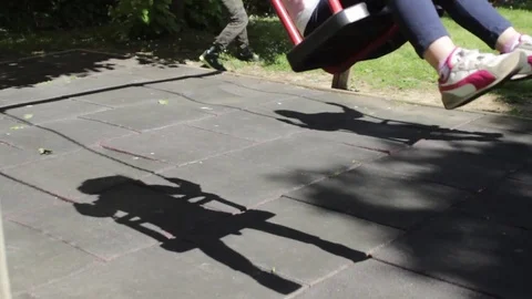 Children playing with seesaw Stock Footage 75312912