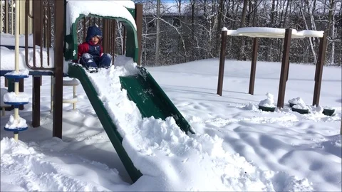 Children playing in snow Stock Footage 104122493