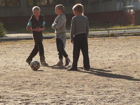 Children playing soccer Stock Footage 42899775