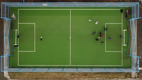 Children playing soccer Video stock 220463167