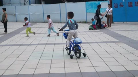 Children playing in the square Stock Footage 42974862
