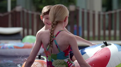 Children playing in swimming pool. Stock Footage 64105204