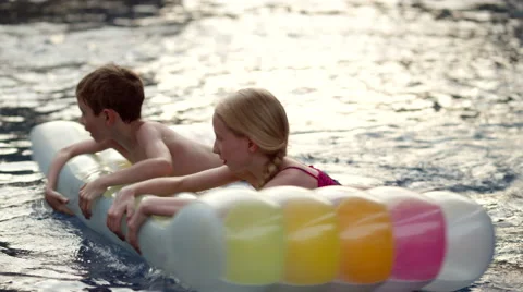 Children playing in swimming pool. Stock Footage 64106217