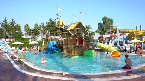 Children playing in the swimming pool Stock Footage 157448990