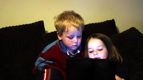 Children playing with tablet Stock Footage 46725796