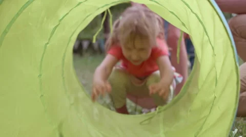 Children Playing with Tent Tunnel Stock Footage