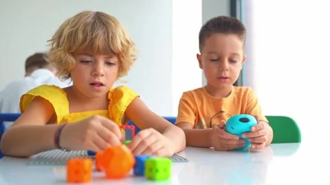 Children playing with toy car control panel in STEM educational class Stock Footage 255913323