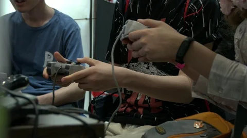 Children Playing Video Games At Comic-Con Event Stock Footage 90134771
