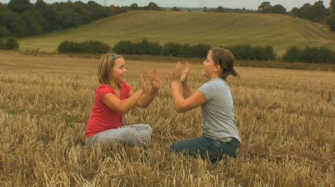 Children playing in a wheat field Stock Footage 522389