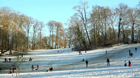 Children playing in winter park. Stock Footage 58592218
