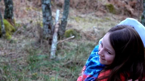 Children playing in the woods Stock Footage 103850490