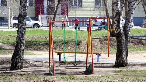 Children playing in the yard with a ball Stock Footage 75034752