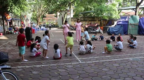 Children playing in the yard Stock Footage 58626525