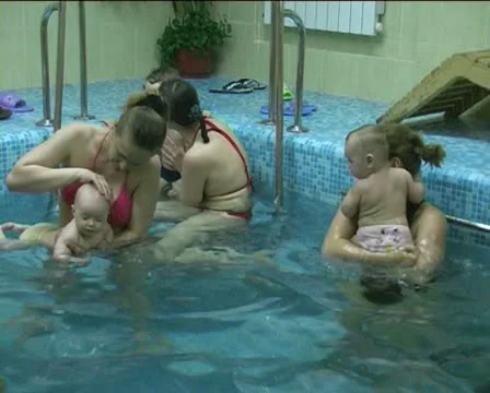 Children in pool Stock Footage 10793838