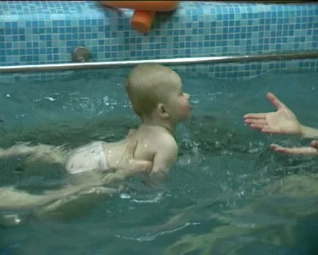 Children in pool Stock Footage 10793844
