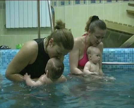 Children in pool Stock Footage 10793859