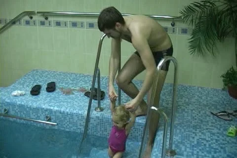 Children in pool Stock Footage 10793877