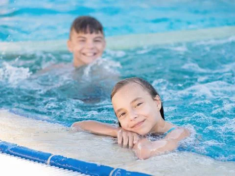 Children in pool Stock Photos