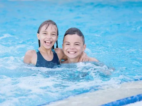 Children in pool Stock Photos