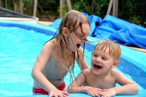 Children in the pool Stock Photos