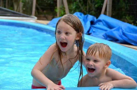 Children in the pool Stock Photos