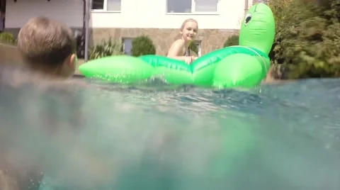 Children in the pool. Underwater view. Video stock 66283819