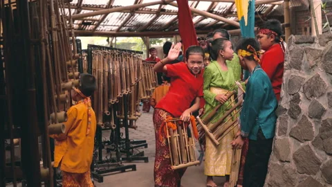 Children posing while preparing for Angklung Show Stock Footage 85644276