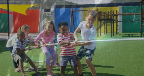 Children pulling rope on playground turf, showing animated education data charts Stock Footage 307973229