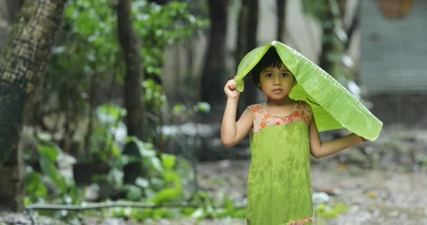 Children in rain Stock Footage 134298495