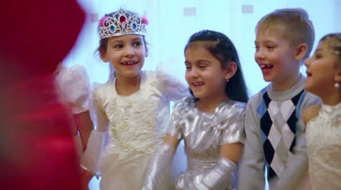 Children raise hands when play game during celebration Stock-Footage 22734055