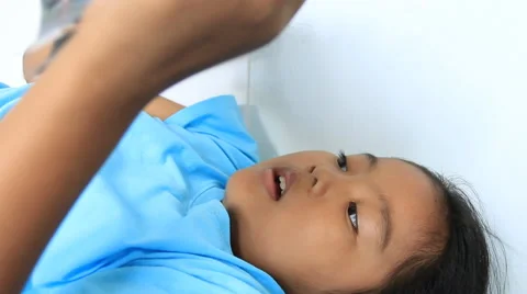 Children reading on the bed 스톡 동영상 42163749