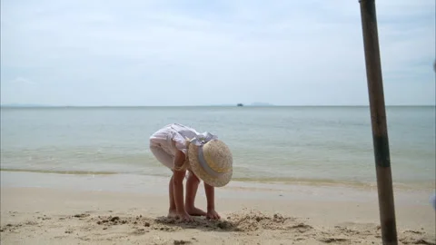 Children relaxing on the beach Stock Footage 308088000