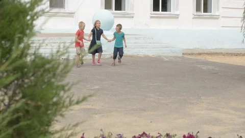 Children return to school. beginning of new school year after summer holidays Stock Footage 93165175