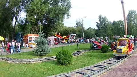 Children ride on a carousel 2 Stock Footage 114376443